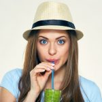 woman-drinking-green-juice